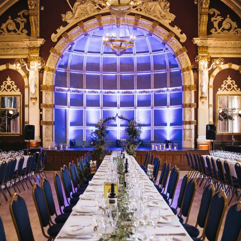London reception with vintage decor and foliage styling