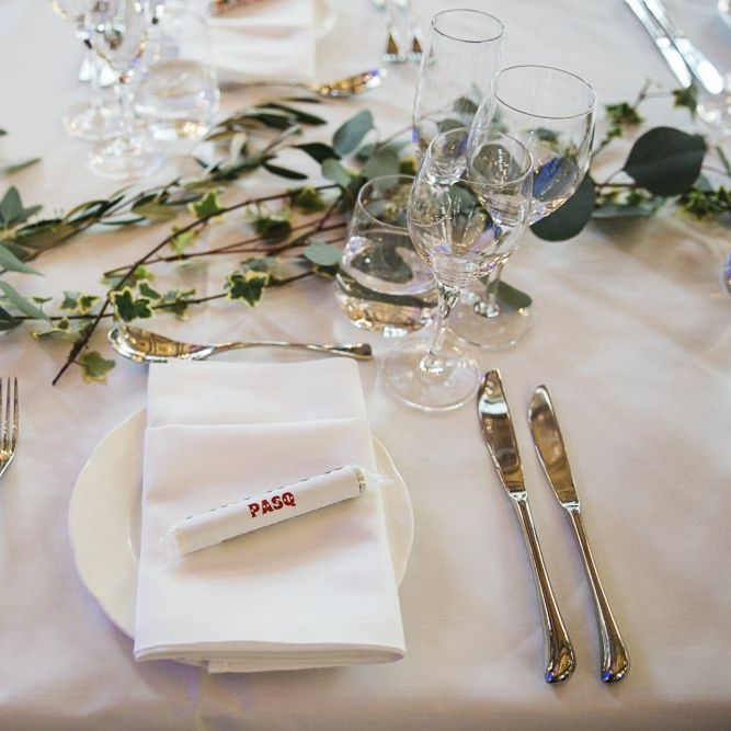 Table styling with personalised Love Heart place settings and foliage decor