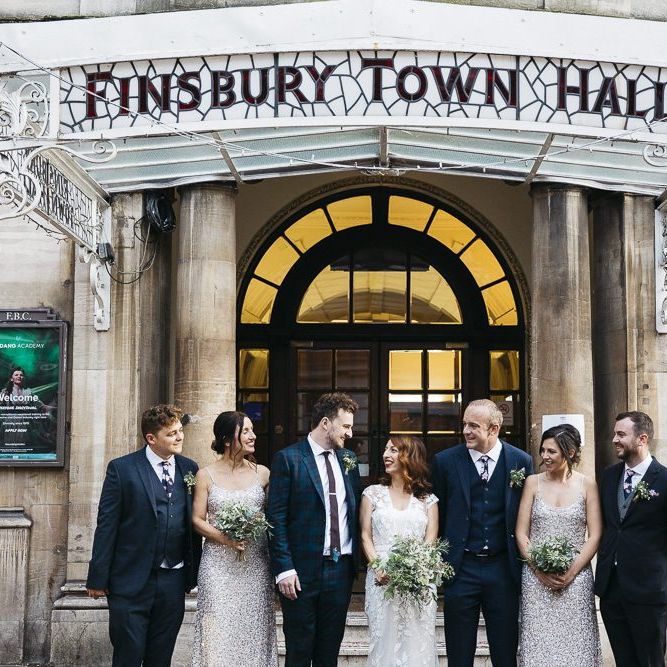 Bride wearing Phase Eight Wedding Dress with her  Groom and guests at Finsbury Town Hall reception