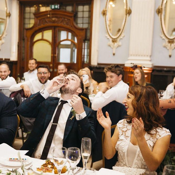Groom having a vodka jelly hot at London celebration