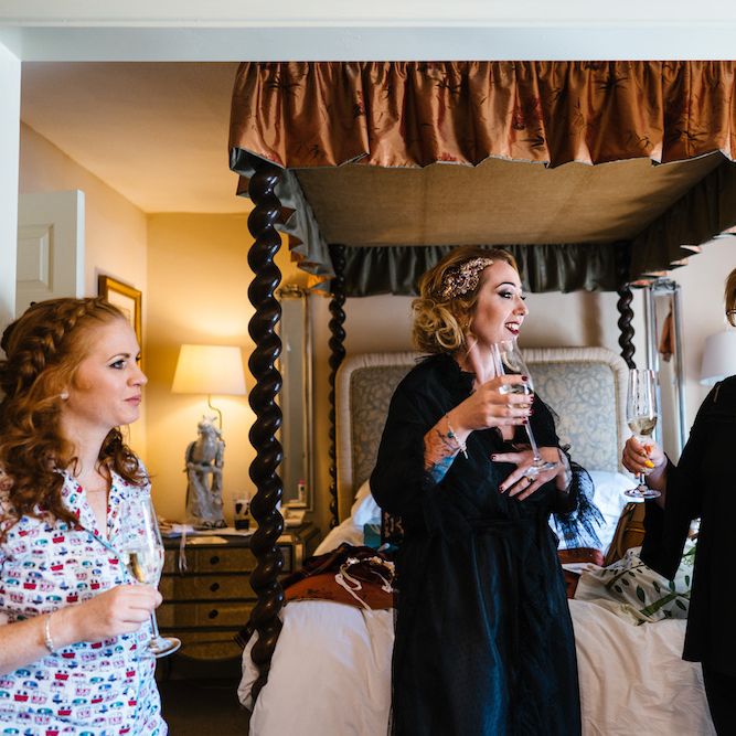Wedding Morning Preparations | Bridal Party Champagne | Edison Bulb Floral Installation at Kingsthorpe Lodge Barn Wedding | Johnny Dent Photography
