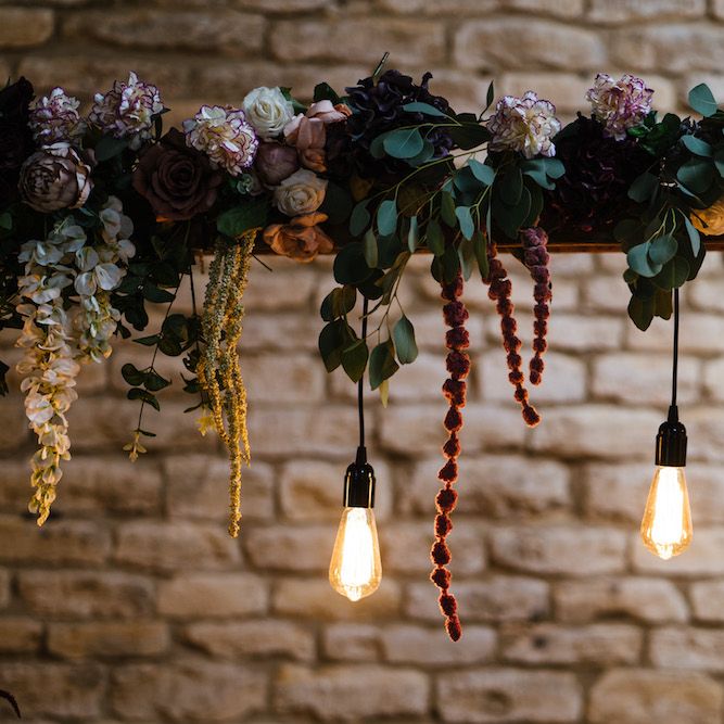 Wedding Reception Decor | Eddison Bulbs Hanging from Floral Installation | Edison Bulb Floral Installation at Kingsthorpe Lodge Barn Wedding | Johnny Dent Photography