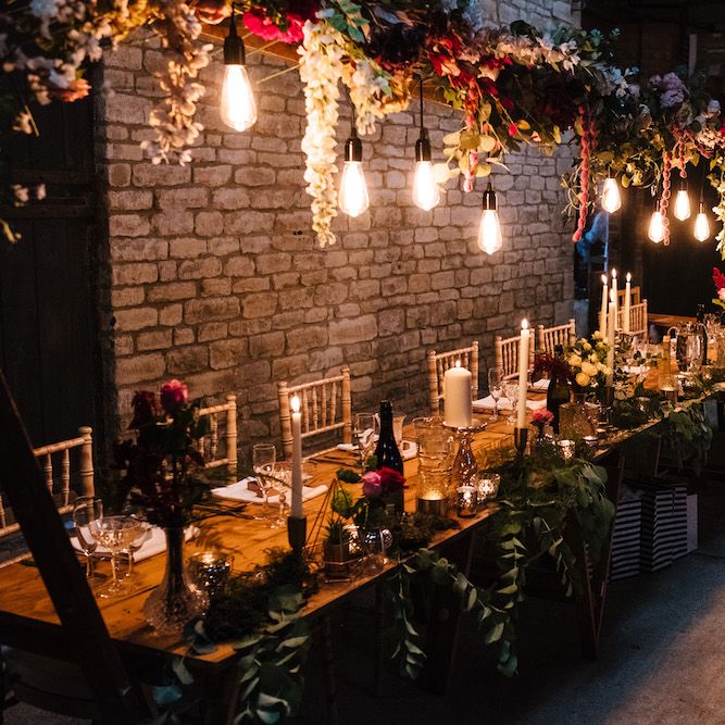 Wedding Reception Decor | Banquet Tables | Edison Bulbs Hanging from Floral Installation | Top Table | Eddison Bulb Floral Installation at Kingsthorpe Lodge Barn Wedding | Johnny Dent Photography