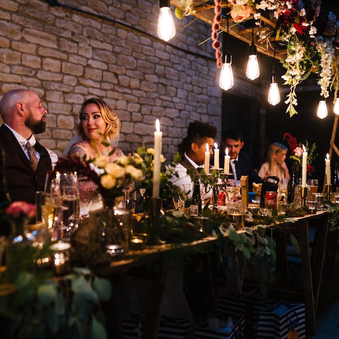 Wedding Reception Decor | Banquet Tables | Edison Bulbs Hanging from Floral Installation | Top Table | Eddison Bulb Floral Installation at Kingsthorpe Lodge Barn Wedding | Johnny Dent Photography