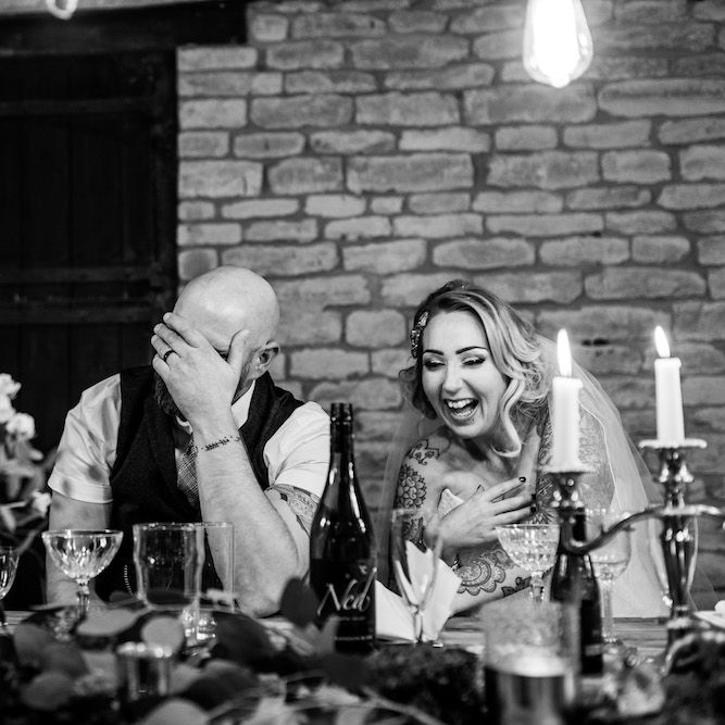 Wedding Reception | Bride in Strapless Sassi Holford Wedding Dress with Sweetheart Neckline | Groom in Burgundy Tweed Three Piece Suit | Edison Bulb Floral Installation at Kingsthorpe Lodge Barn Wedding | Johnny Dent Photography