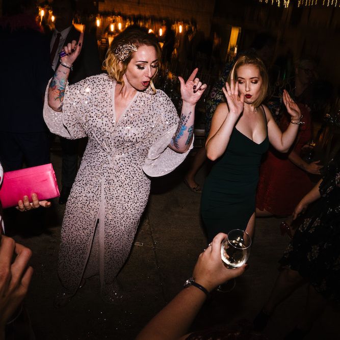 Bride in Sequinned Kimono from ASOS | Edison Bulb Floral Installation at Kingsthorpe Lodge Barn Wedding | Johnny Dent Photography