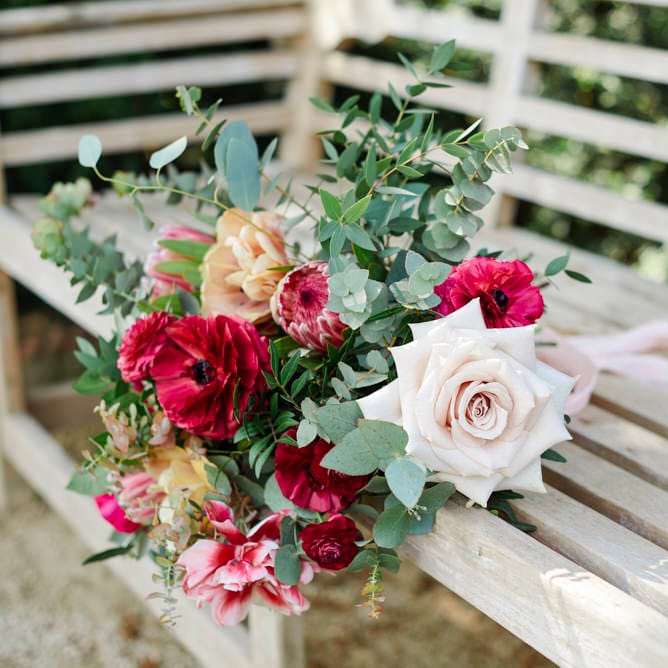 Bridal Bouquet With Pale Pink Roses And Berry Coloured Anemones