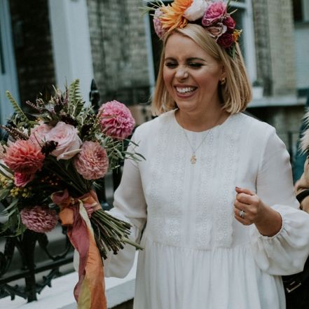 City bride with blush flower crown