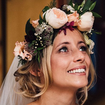 Beautiful bride with peach flower crown
