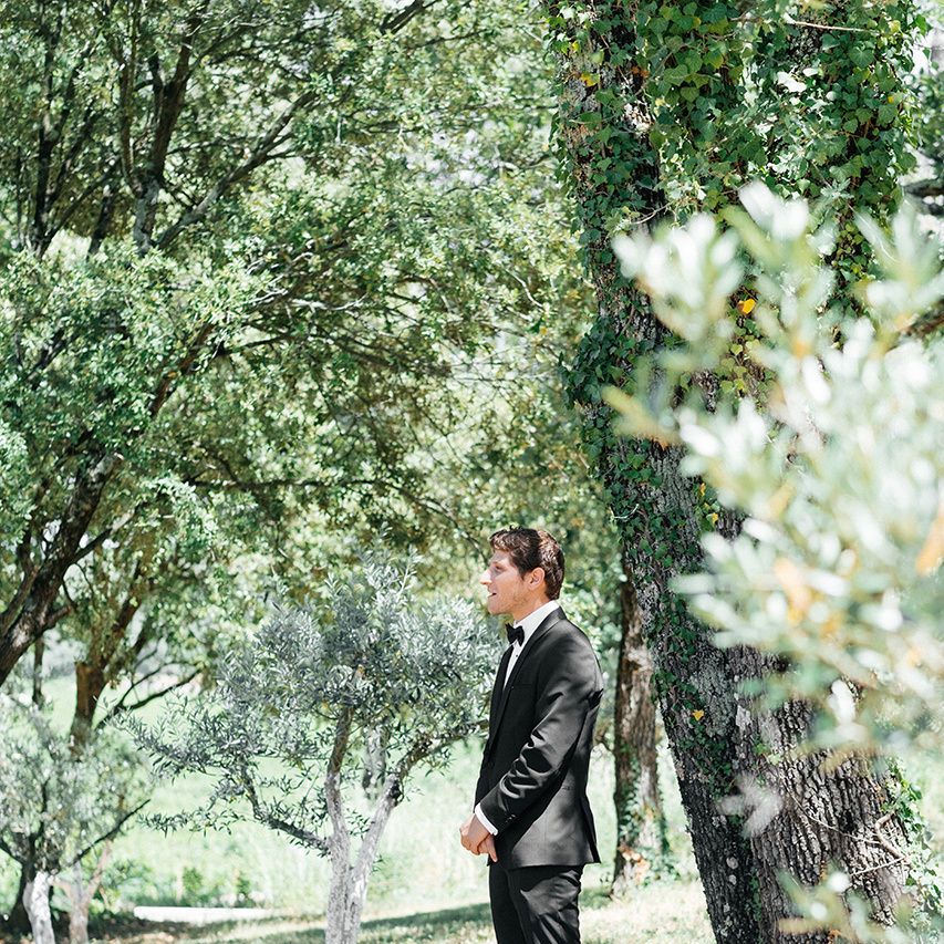 Groom in Black Tie Suit | Outdoor Wedding at Commanderie de Peyrassol, Provence, France Styled by La Chuchoteuse | Lace Bridal Gown | Black Tie Suit | Rustic Stretch Tent Reception | Raisa Zwart Photography