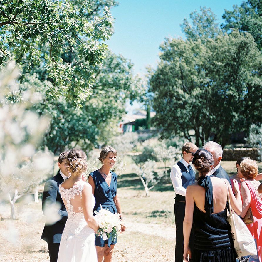 Elegant Bride in Lace Wedding Dress | Outdoor Wedding at Commanderie de Peyrassol, Provence, France Styled by La Chuchoteuse | Lace Bridal Gown | Black Tie Suit | Rustic Stretch Tent Reception | Raisa Zwart Photography