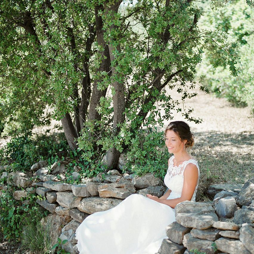 Elegant Bride in Lace Wedding Dress | Outdoor Wedding at Commanderie de Peyrassol, Provence, France Styled by La Chuchoteuse | Lace Bridal Gown | Black Tie Suit | Rustic Stretch Tent Reception | Raisa Zwart Photography