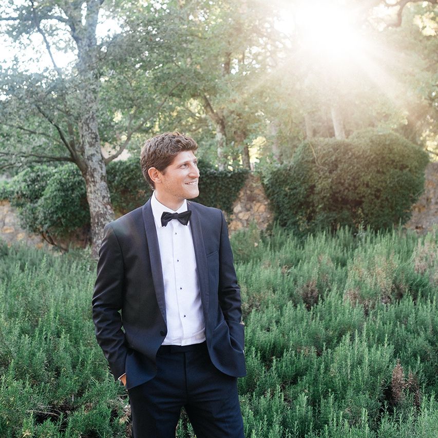 Groom in Tuxedo Suit | Outdoor Wedding at Commanderie de Peyrassol, Provence, France Styled by La Chuchoteuse | Lace Bridal Gown | Black Tie Suit | Rustic Stretch Tent Reception | Raisa Zwart Photography