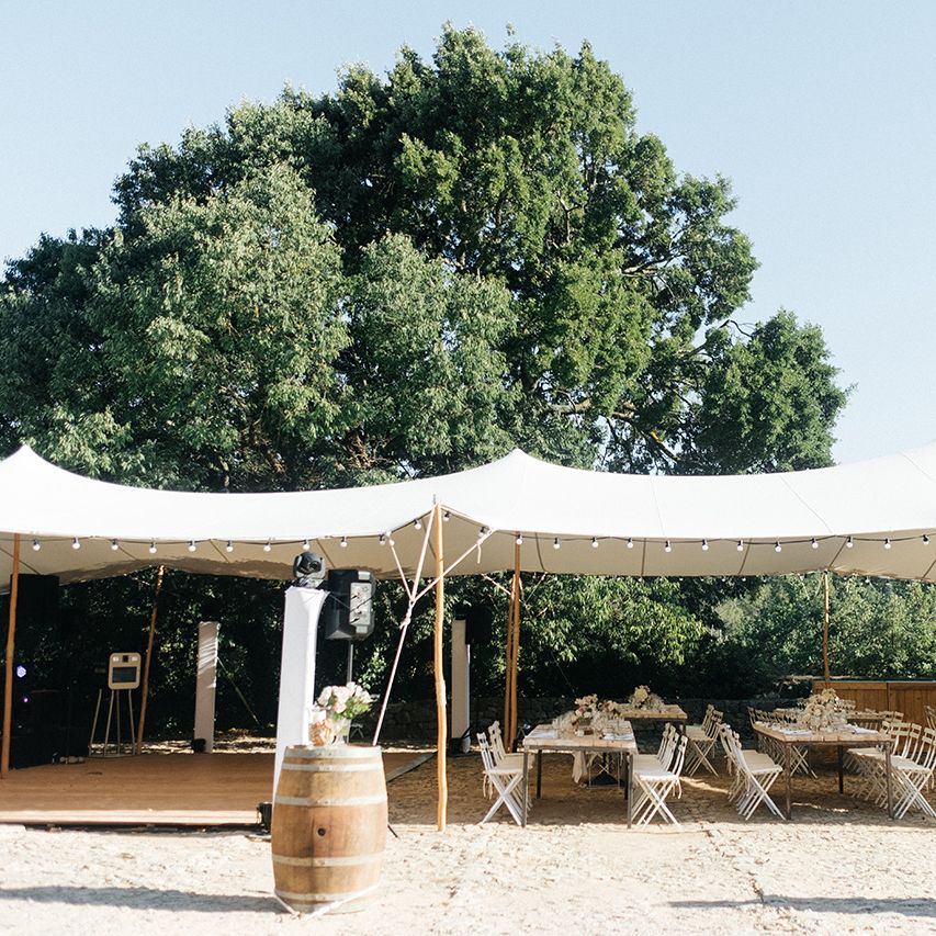 Stretch Tent Wedding Reception | Outdoor Wedding at Commanderie de Peyrassol, Provence, France Styled by La Chuchoteuse | Lace Bridal Gown | Black Tie Suit | Rustic Stretch Tent Reception | Raisa Zwart Photography