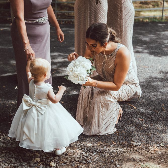 Flower Girl In White Dress With Bow // The Vedrines Photography