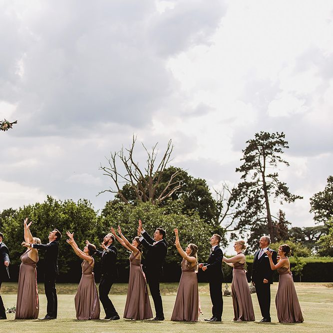 Bouquet Toss // Geometric Details &amp; Hanging Foliage For Hengrave Hall Wedding With Outdoor Reception With Images From Sam And Louise Photography