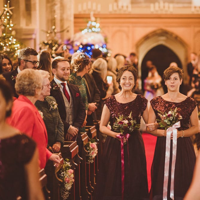 Church Wedding Ceremony | Bridesmaid Entrance in Coast Separates | Burgundy &amp; Gold Winter Wedding at Ramster Hall Weddings, Surrey | Matt Penberthy Photography | John Harris Wedding Films