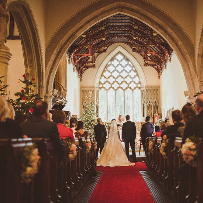 Church Wedding Ceremony | Bride in Lillian West Bridal Separates | Groom in Navy Suit &amp; Tweed Waistcoat | Burgundy &amp; Gold Winter Wedding at Ramster Hall Weddings, Surrey | Matt Penberthy Photography | John Harris Wedding Films
