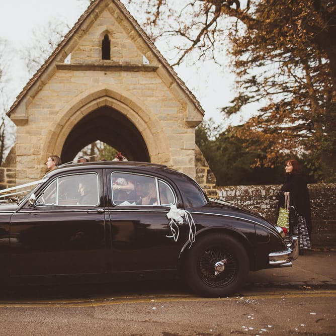 Wedding Car | Burgundy &amp; Gold Winter Wedding at Ramster Hall Weddings, Surrey | Matt Penberthy Photography | John Harris Wedding Films