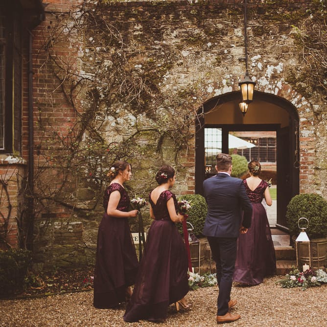 Bridesmaids in Burgundy Coast Sequin Top &amp; High Low Skirt Separates | Burgundy &amp; Gold Winter Wedding at Ramster Hall Weddings, Surrey | Matt Penberthy Photography | John Harris Wedding Films