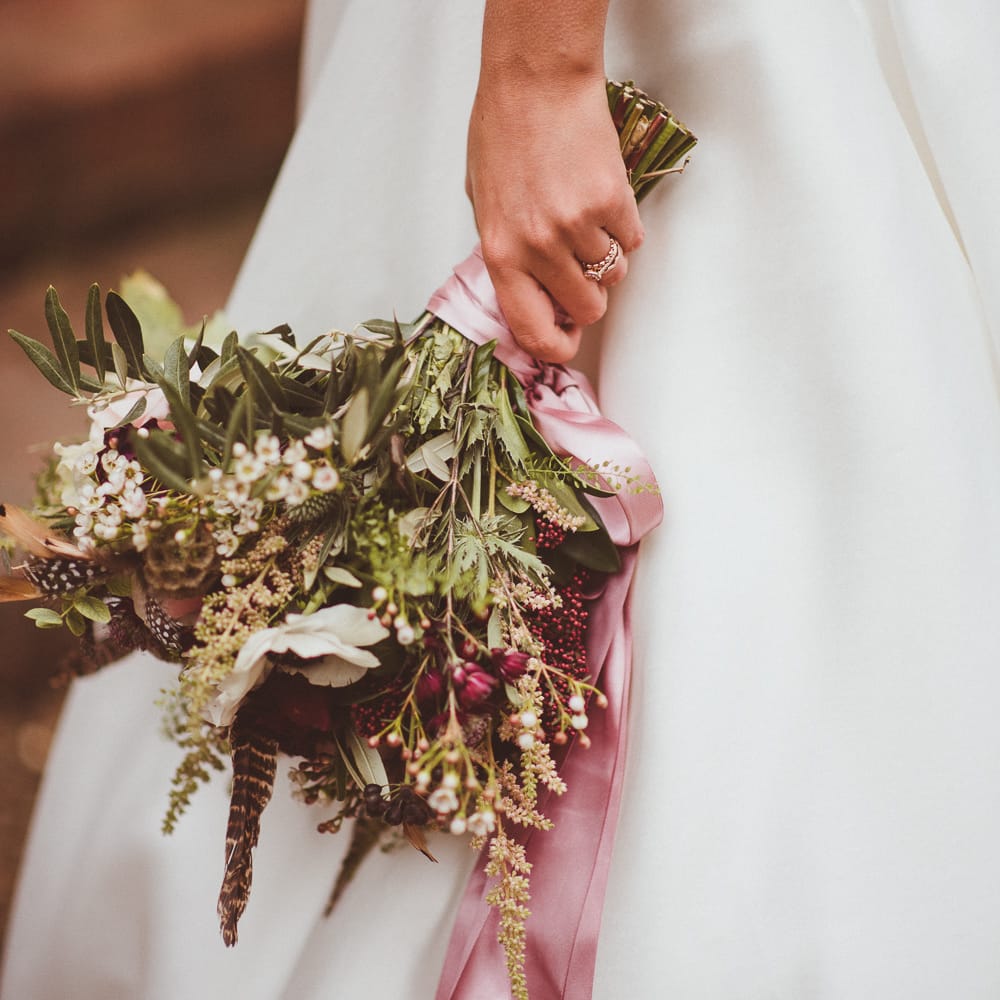 Winter Wedding Bouquet with Ribbons | Burgundy &amp; Gold Winter Wedding at Ramster Hall Weddings, Surrey | Matt Penberthy Photography | John Harris Wedding Films