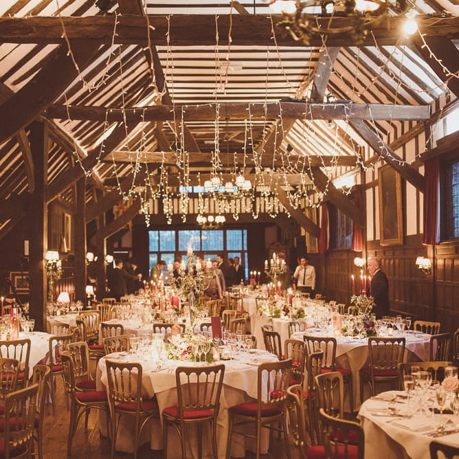 String Lights Fairy Light Canopy | Burgundy &amp; Gold Winter Wedding at Ramster Hall Weddings, Surrey | Matt Penberthy Photography | John Harris Wedding Films