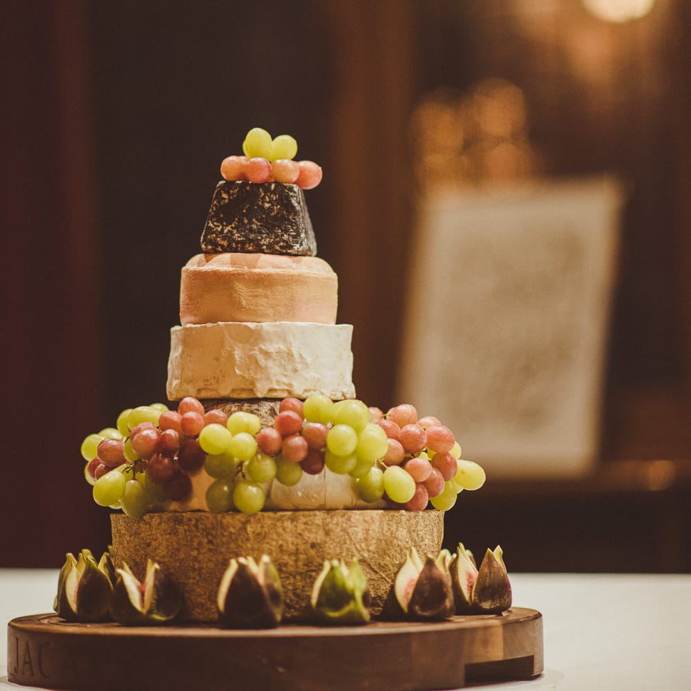 Cheese Tower Wedding Cake | Burgundy &amp; Gold Winter Wedding at Ramster Hall Weddings, Surrey | Matt Penberthy Photography | John Harris Wedding Films