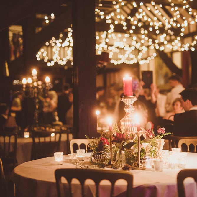 String Lights Wedding Reception Decor | Burgundy &amp; Gold Winter Wedding at Ramster Hall Weddings, Surrey | Matt Penberthy Photography | John Harris Wedding Films