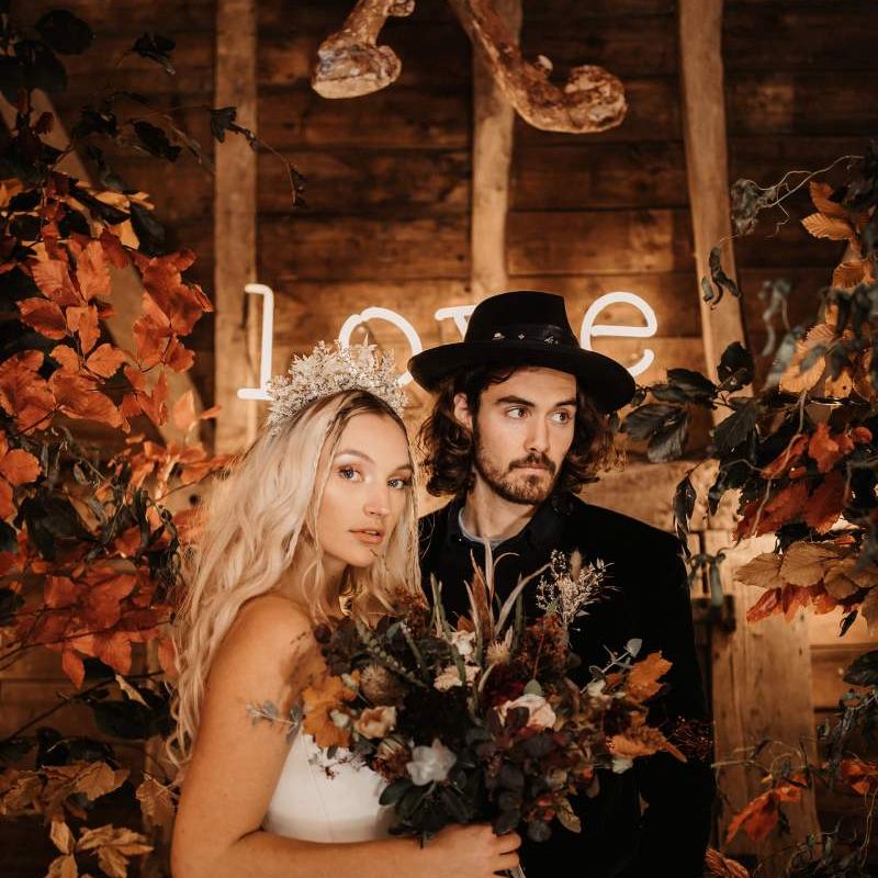 Bridal crown and groom in hat for Halloween wedding at Preston Court