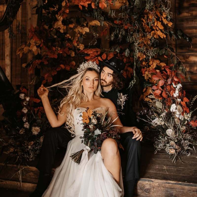 Stylish bride and groom at Halloween wedding