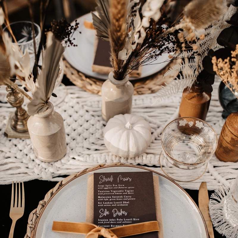 Place setting in Autumn wedding colours for Halloween wedding