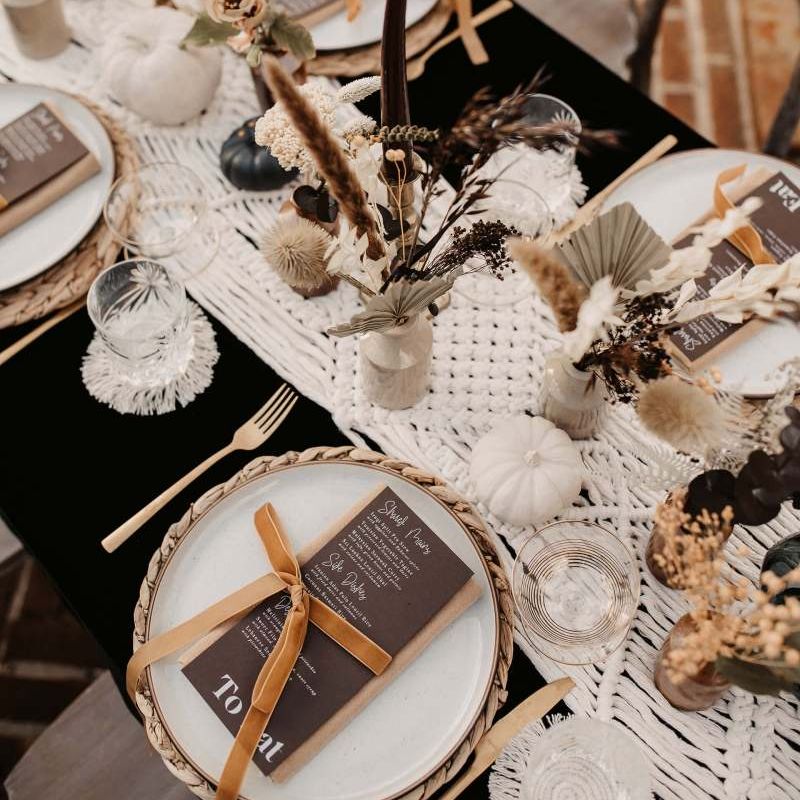 Macrame table runner, white pumpkins and dried flowers for Halloween wedding