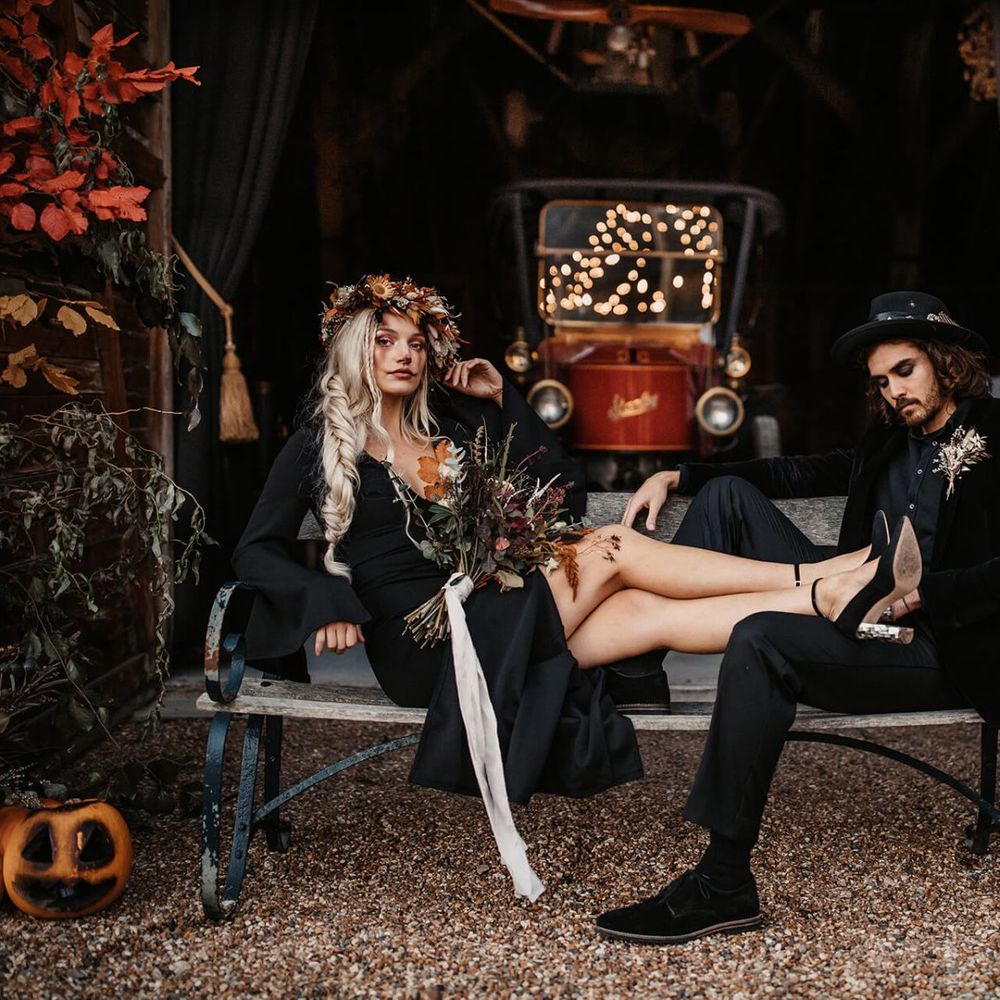 Halloween wedding at Preston court with Autumn wedding flowers, pumpkins and fairy lights