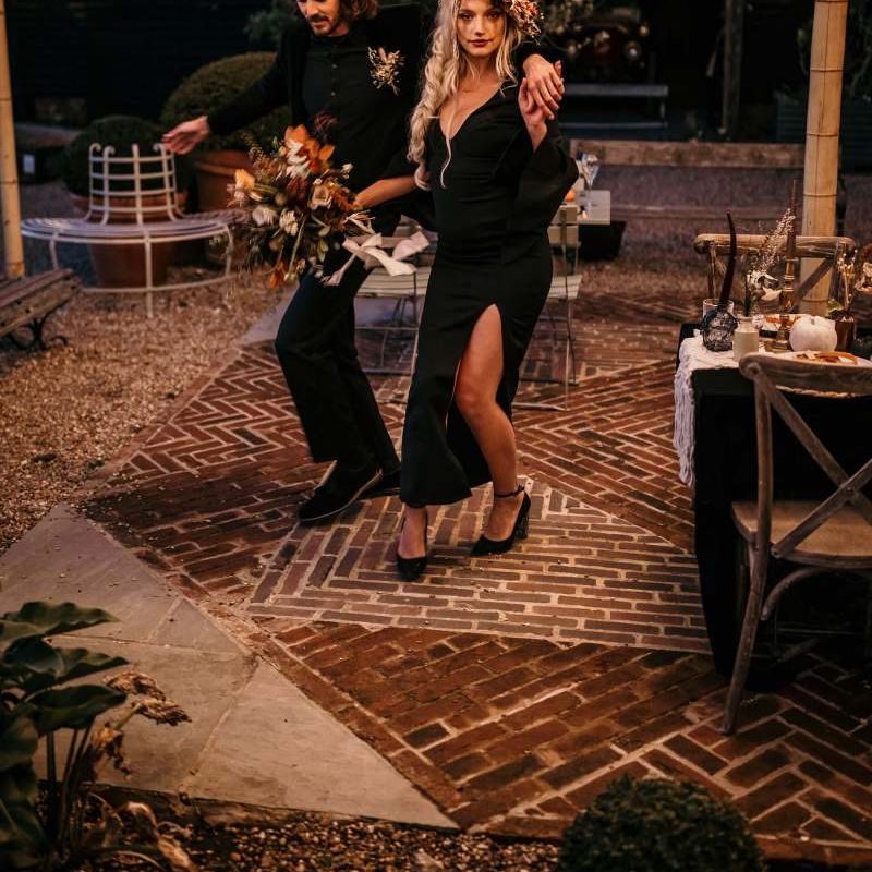 bride and groom dancing outside at Preston Court for Halloween wedding