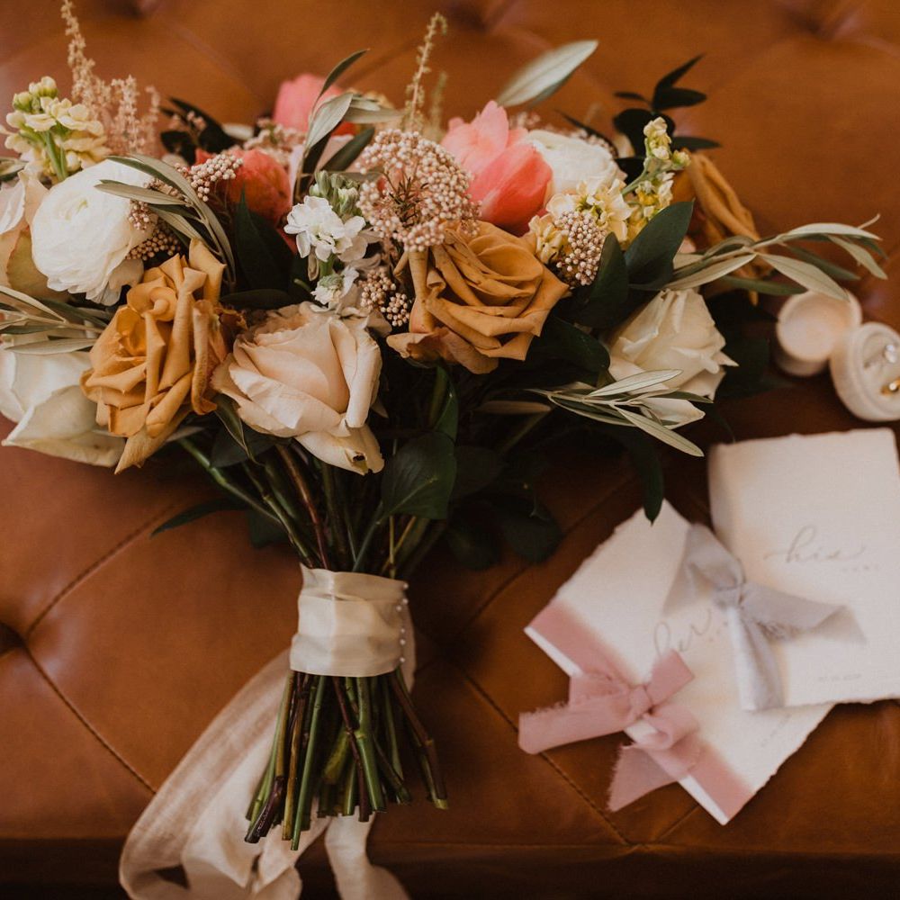 Bridal bouquets, shoes, wedding rings and vow books