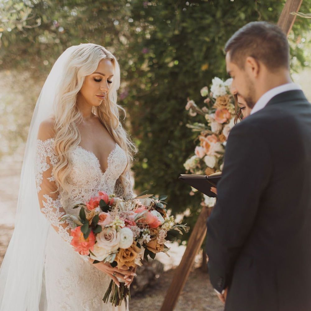 Bride in lace wedding dress at California elopement