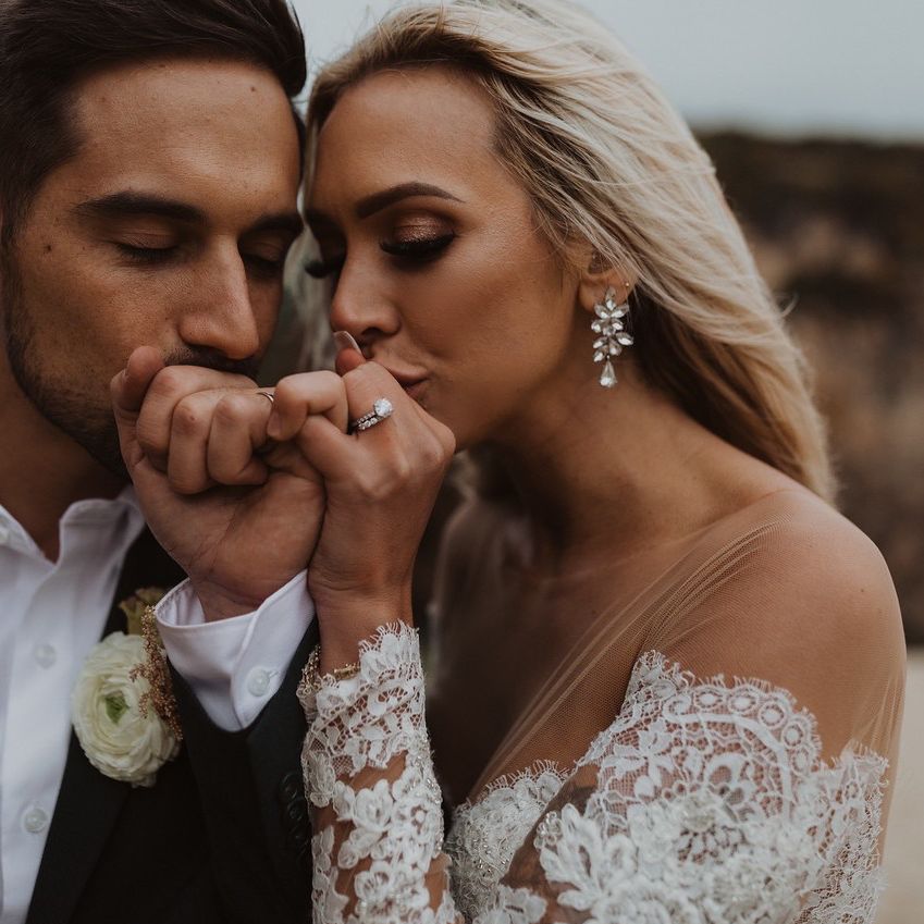 Bride and groom holding hands at California elopement