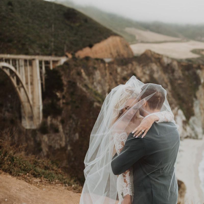 bride and groom portrait on a California hill