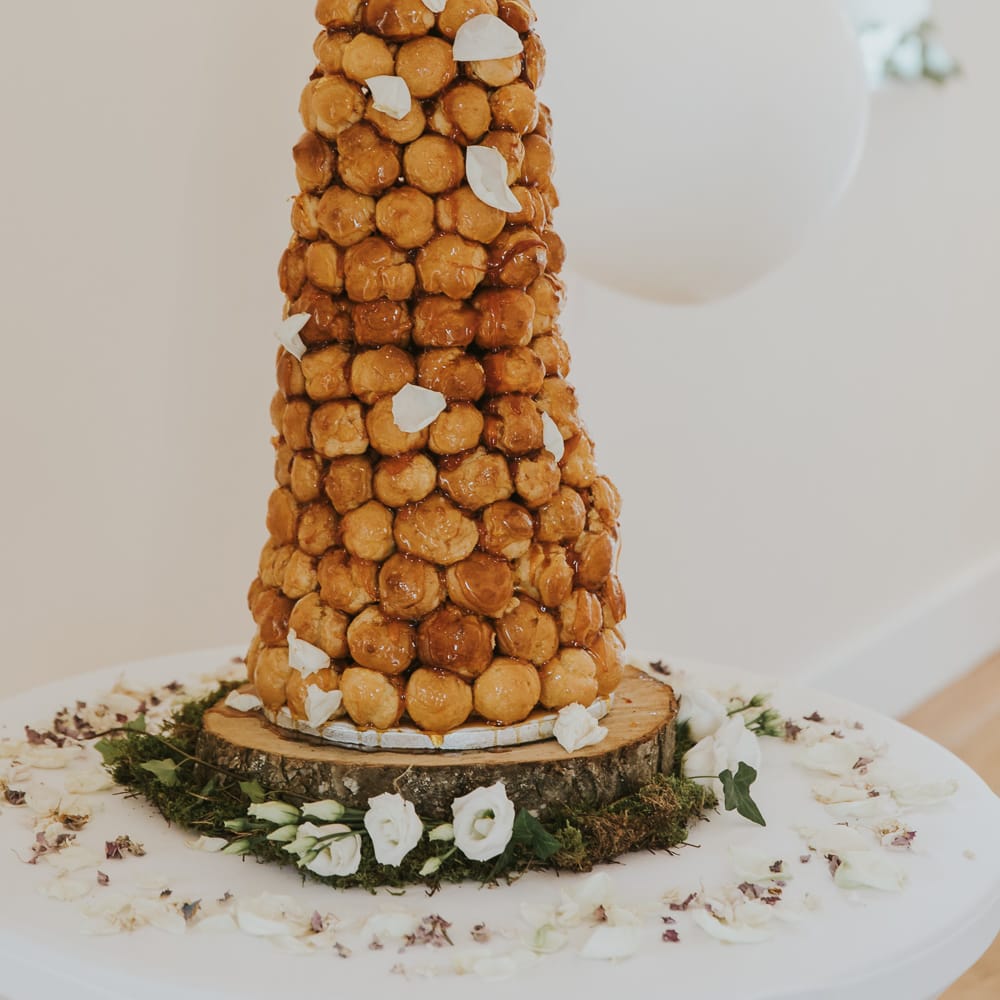 Croquembouche Wedding Cake // Blush Pink Wedding Dress For Outdoor Wedding Ceremony At Hethfelton House With Images From Dorset Wedding Photographer Paul Underhill