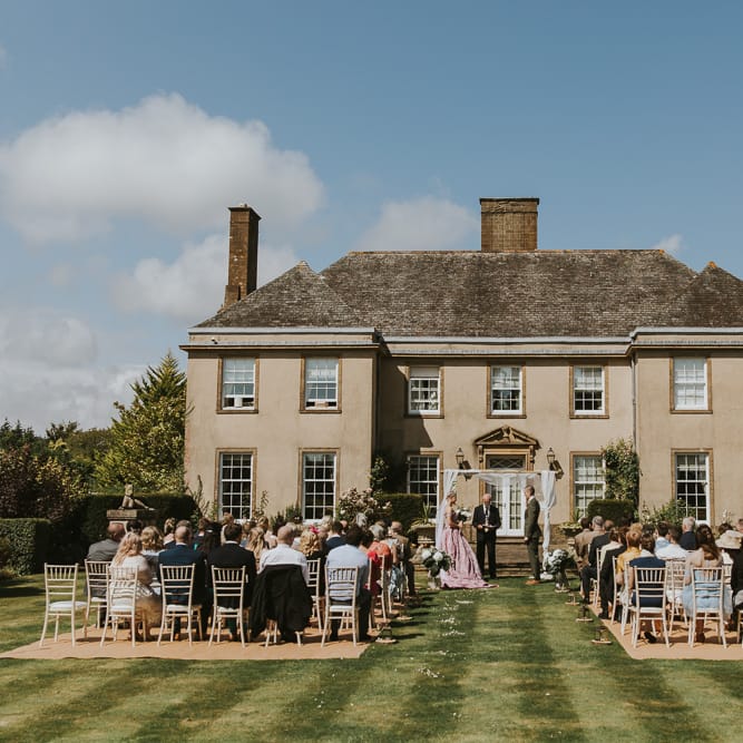 Blush Pink Wedding Dress For Outdoor Wedding Ceremony At Hethfelton House With Images From Dorset Wedding Photographer Paul Underhill
