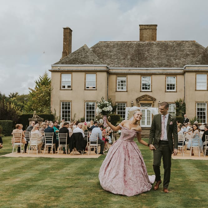 Blush Pink Wedding Dress For Outdoor Wedding Ceremony At Hethfelton House With Images From Dorset Wedding Photographer Paul Underhill