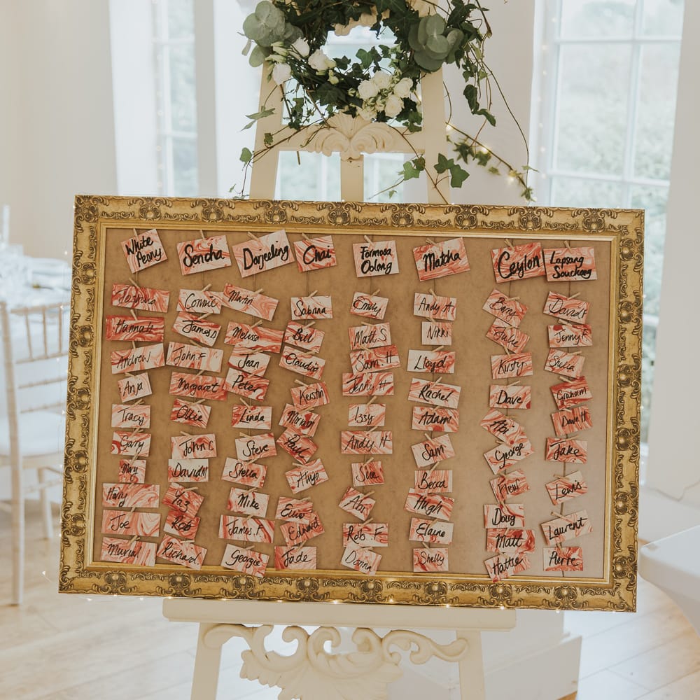 Pink Table Plan For Wedding // Blush Pink Wedding Dress For Outdoor Wedding Ceremony At Hethfelton House With Images From Dorset Wedding Photographer Paul Underhill