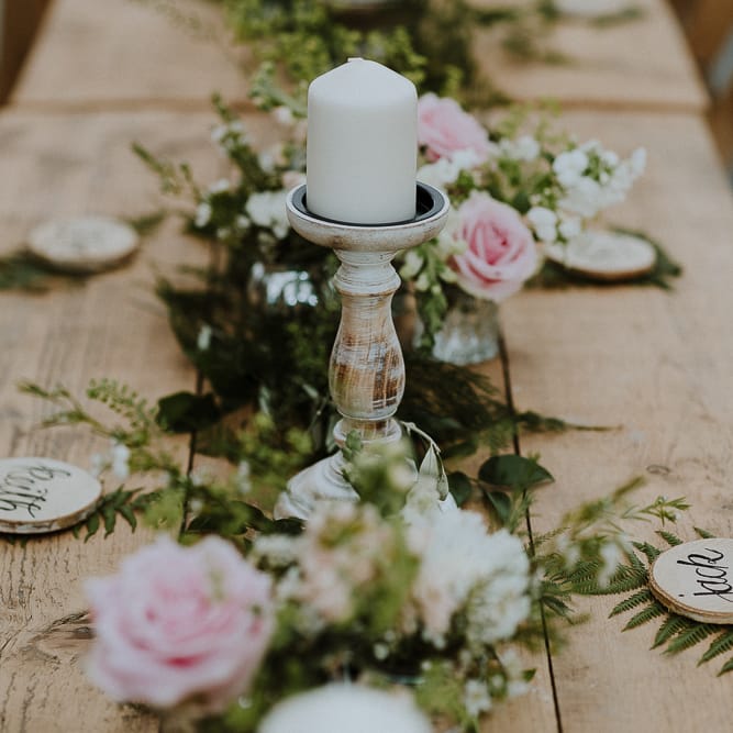 Table Runner of Candle Sticks and Floral Garland