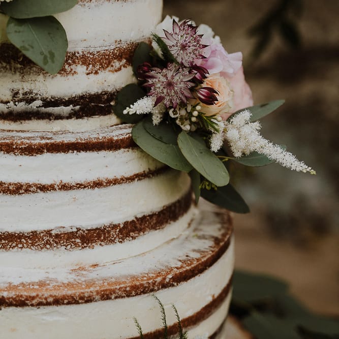 Semi Naked Wedding Cake Decorated with Fresh Flowers