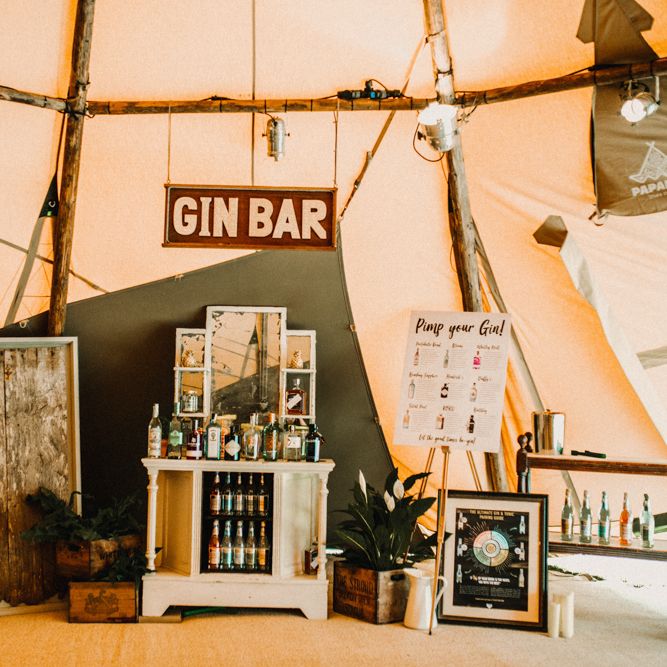 Gin Bar At Wedding // Bride In The Row For Bohemian Wedding In The Cotswolds With PapaKata Tipi And Ceremony At Merriscourt With Images From Carla Blain Photography