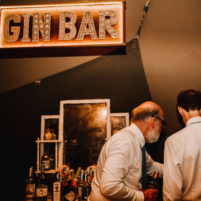 Gin Bar For Wedding // Bride In The Row For Bohemian Wedding In The Cotswolds With PapaKata Tipi And Ceremony At Merriscourt With Images From Carla Blain Photography