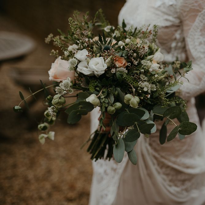 Green, white and peach wedding bouquet for winter wedding