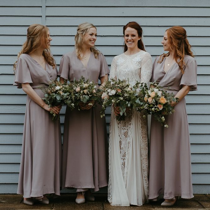Bridal party portrait with bridesmaids in ReWritten dresses