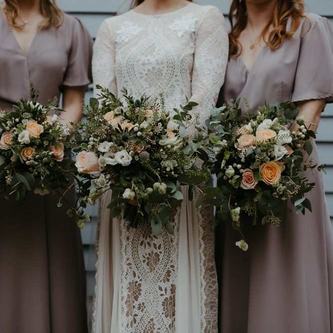 Peach and white flower bouquets with foliage