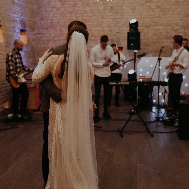 First dance at Lapstone Barn with cathedral length veil